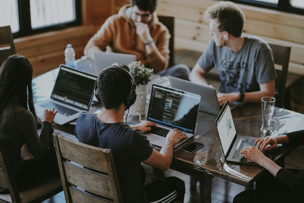 Engineering collaboration — team reviewing system architecture